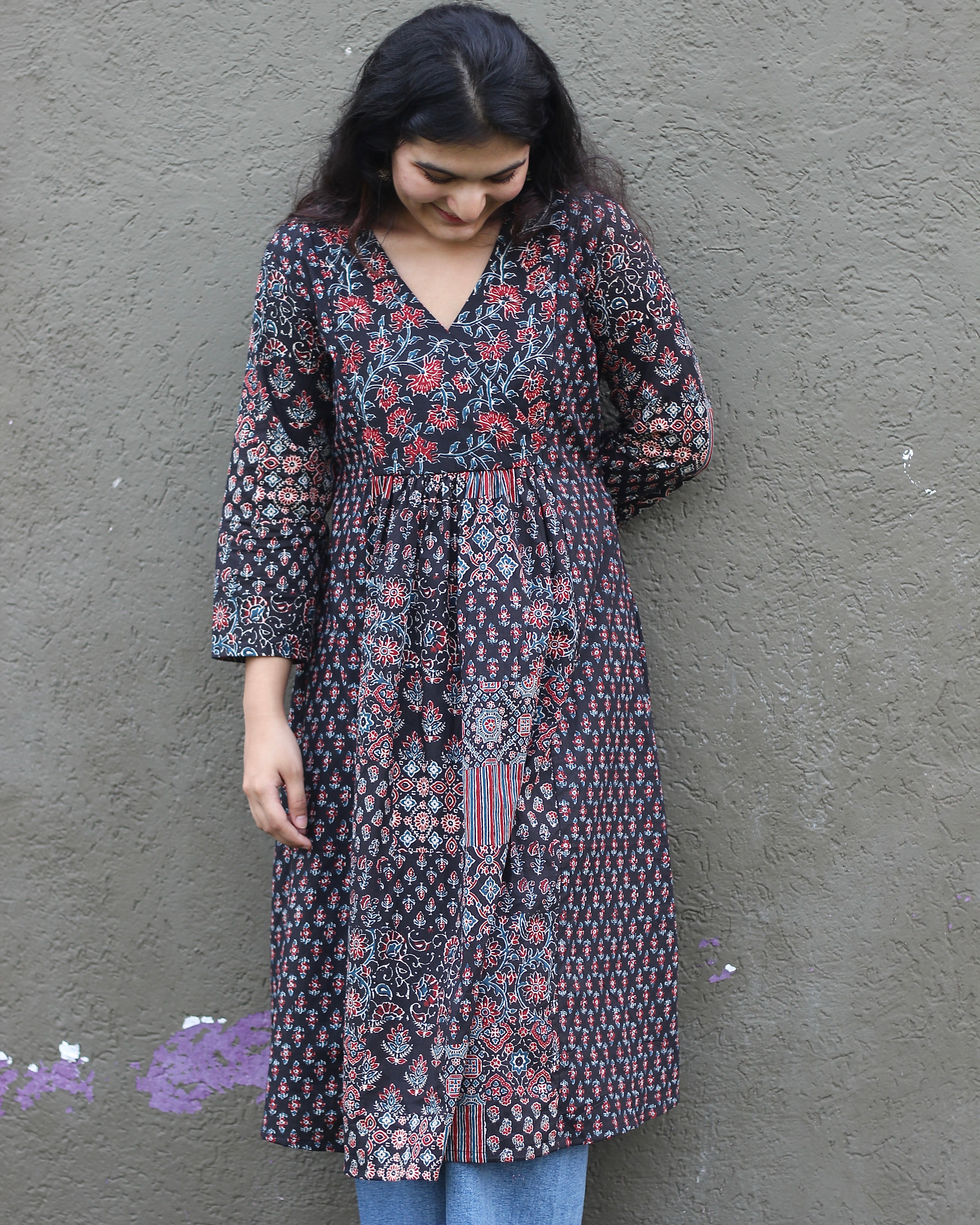 Printed Black Pure Cotton Kurta featuring V-neck and 3/4 sleeves, crafted with three distinct prints in the same shade