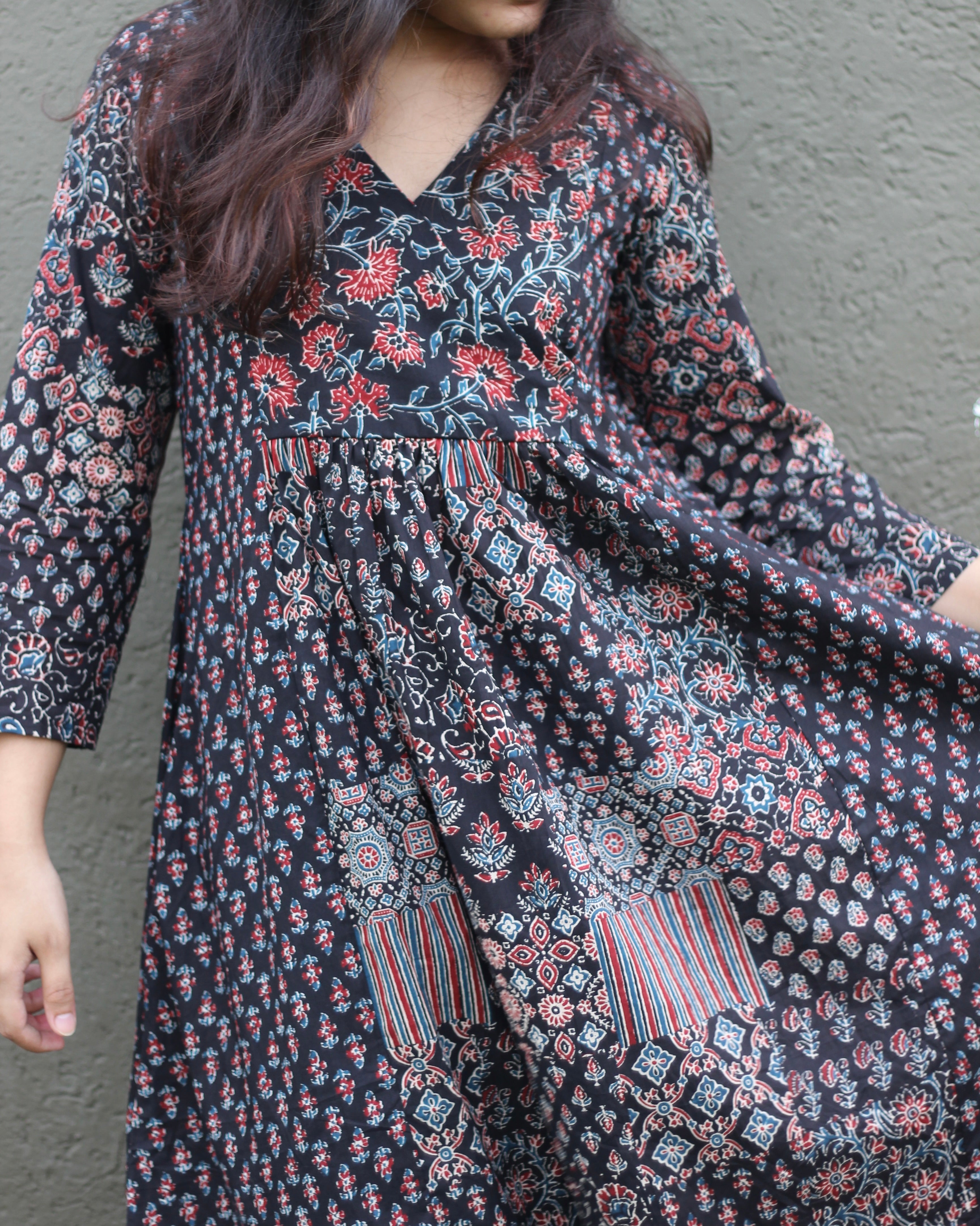 Printed Black Pure Cotton Kurta featuring V-neck and 3/4 sleeves, crafted with three distinct prints in the same shade