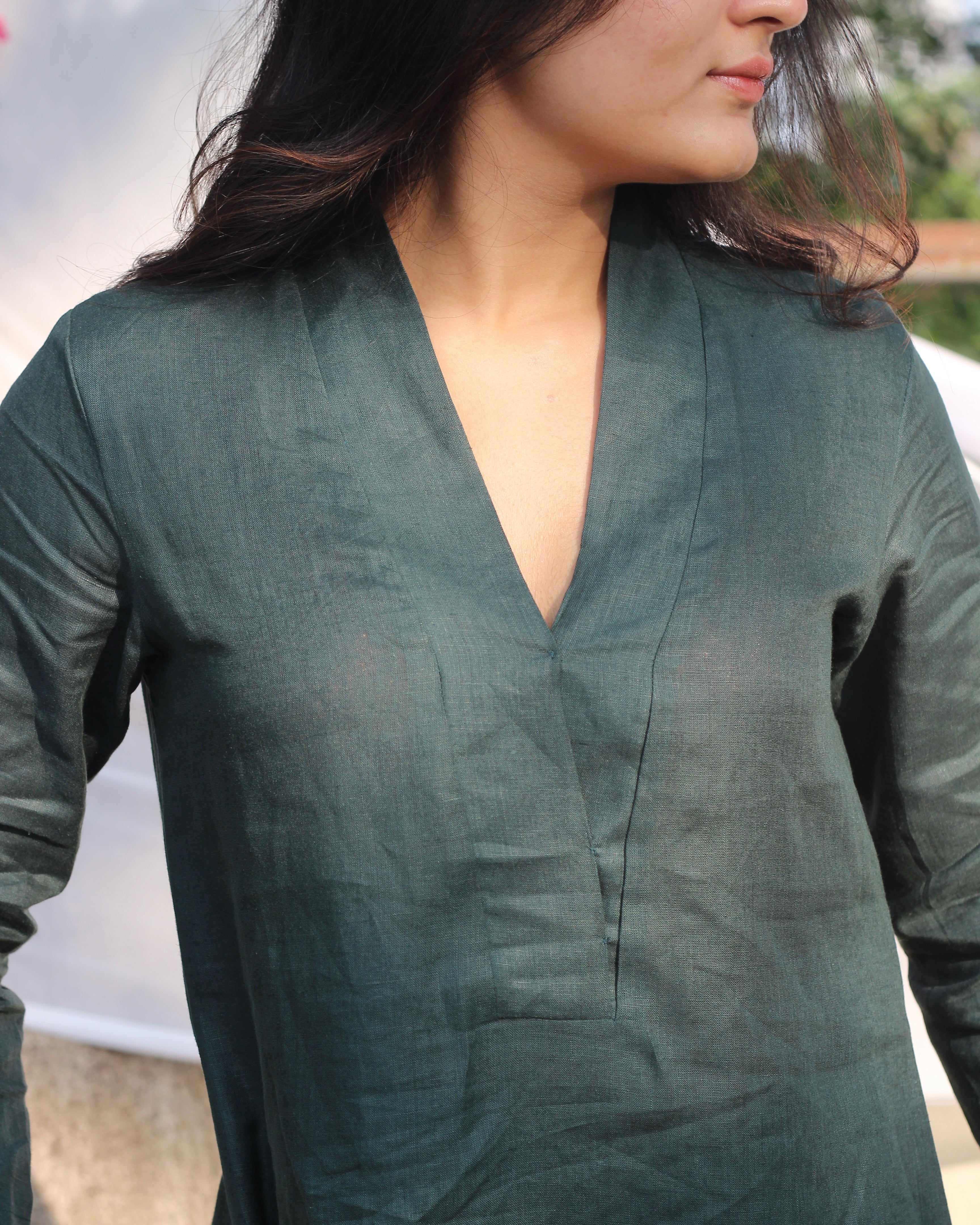SAADGI Collection's Pure Linen Teal Co-ord Set with V-neck kurta, pockets, 3/4 sleeves, perfect for an elegant festive look
