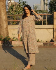 Dusty pink and beige floral A-line kurta set with contrasting booties on pants_6