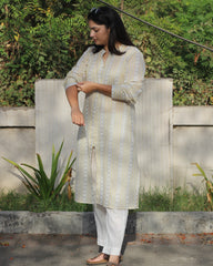 Image of Stripes Mul Cotton Long Kurta in subtle yellow, white, and grey stripes, featuring full sleeves, Chinese collar neck, and side cuts