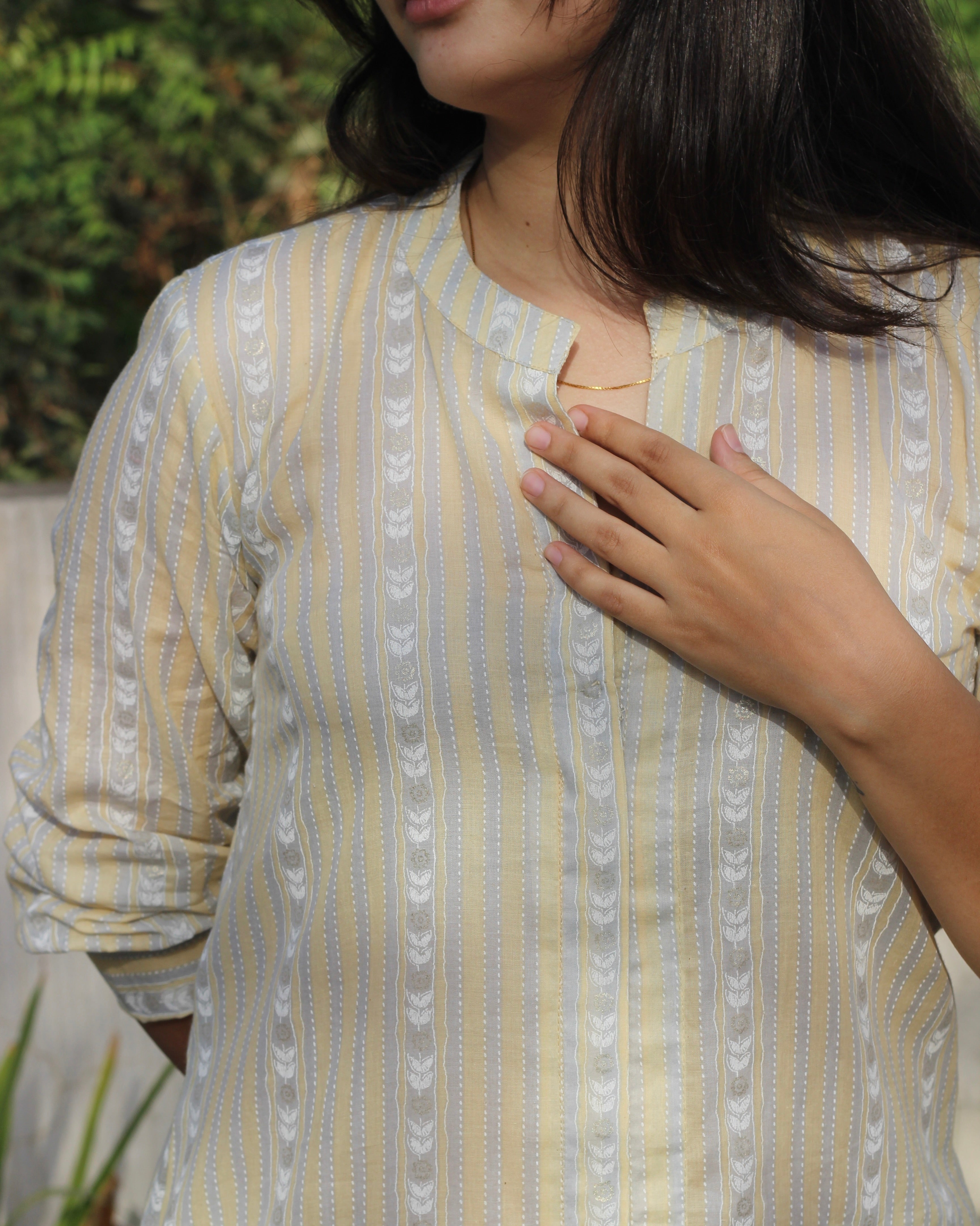 Image of Stripes Mul Cotton Long Kurta in subtle yellow, white, and grey stripes, featuring full sleeves, Chinese collar neck, and side cut