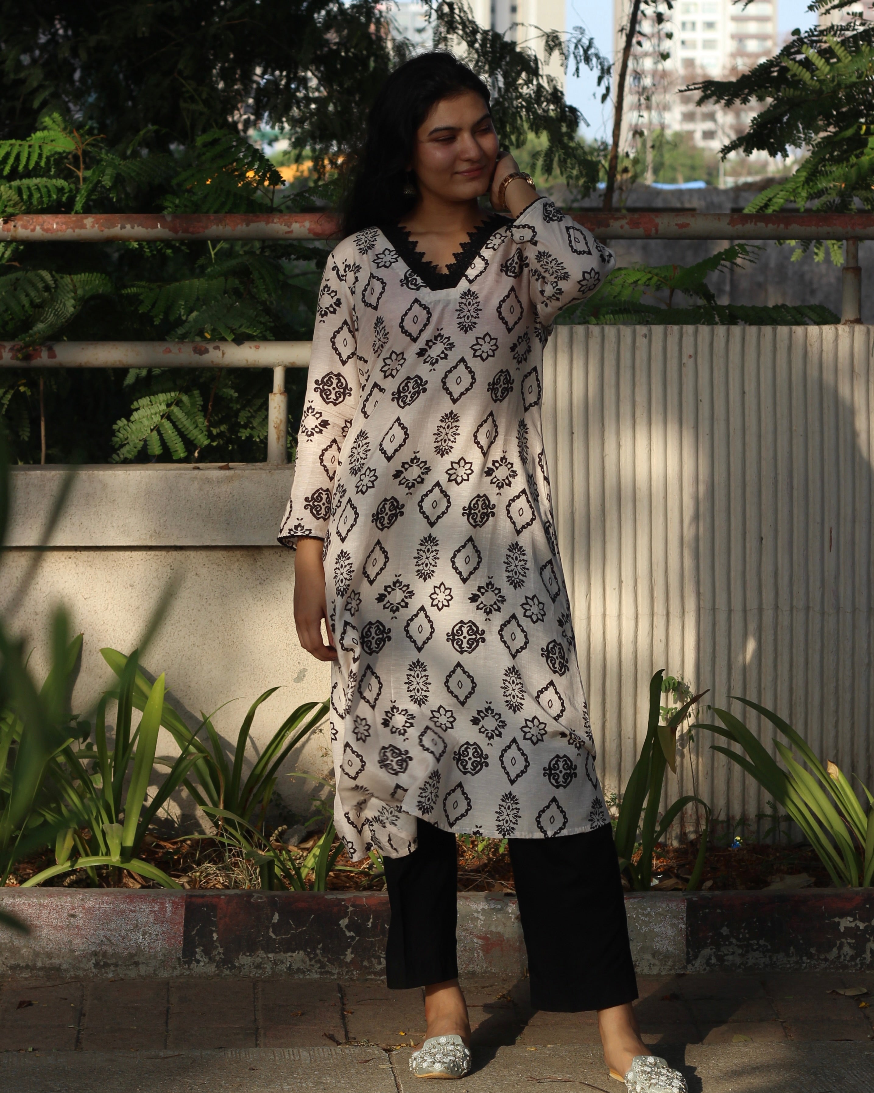 White Ajrakh Printed Muslin Long Kurta with Lace Detail on Neck and Sleeves, and Pocket