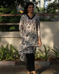 White Ajrakh Printed Muslin Long Kurta with Lace Detail on Neck and Sleeves, and Pocket