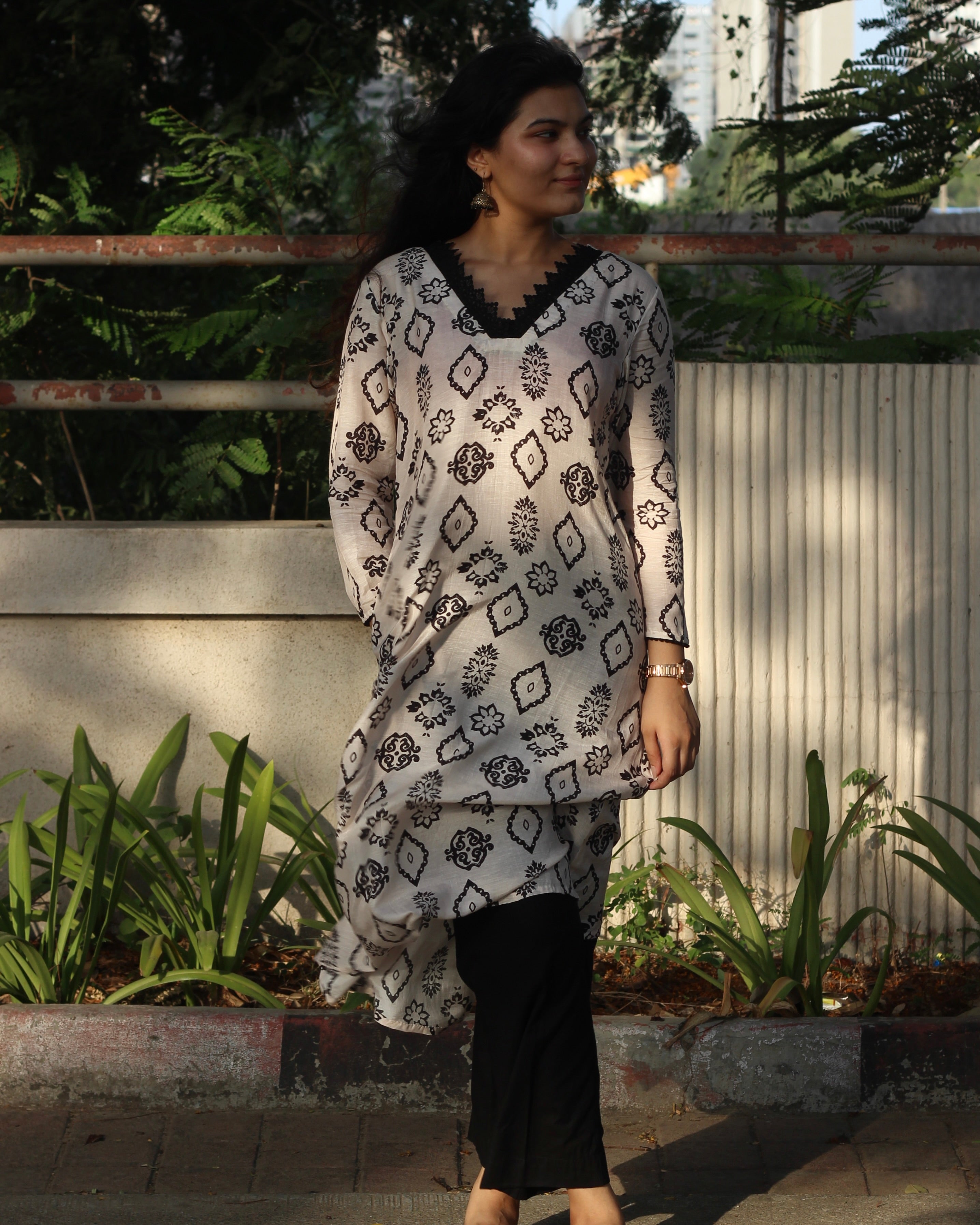 White Ajrakh Printed Muslin Long Kurta with Lace Detail on Neck and Sleeves, and Pocket