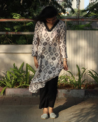 White Ajrakh Printed Muslin Long Kurta with Lace Detail on Neck and Sleeves, and Pocket