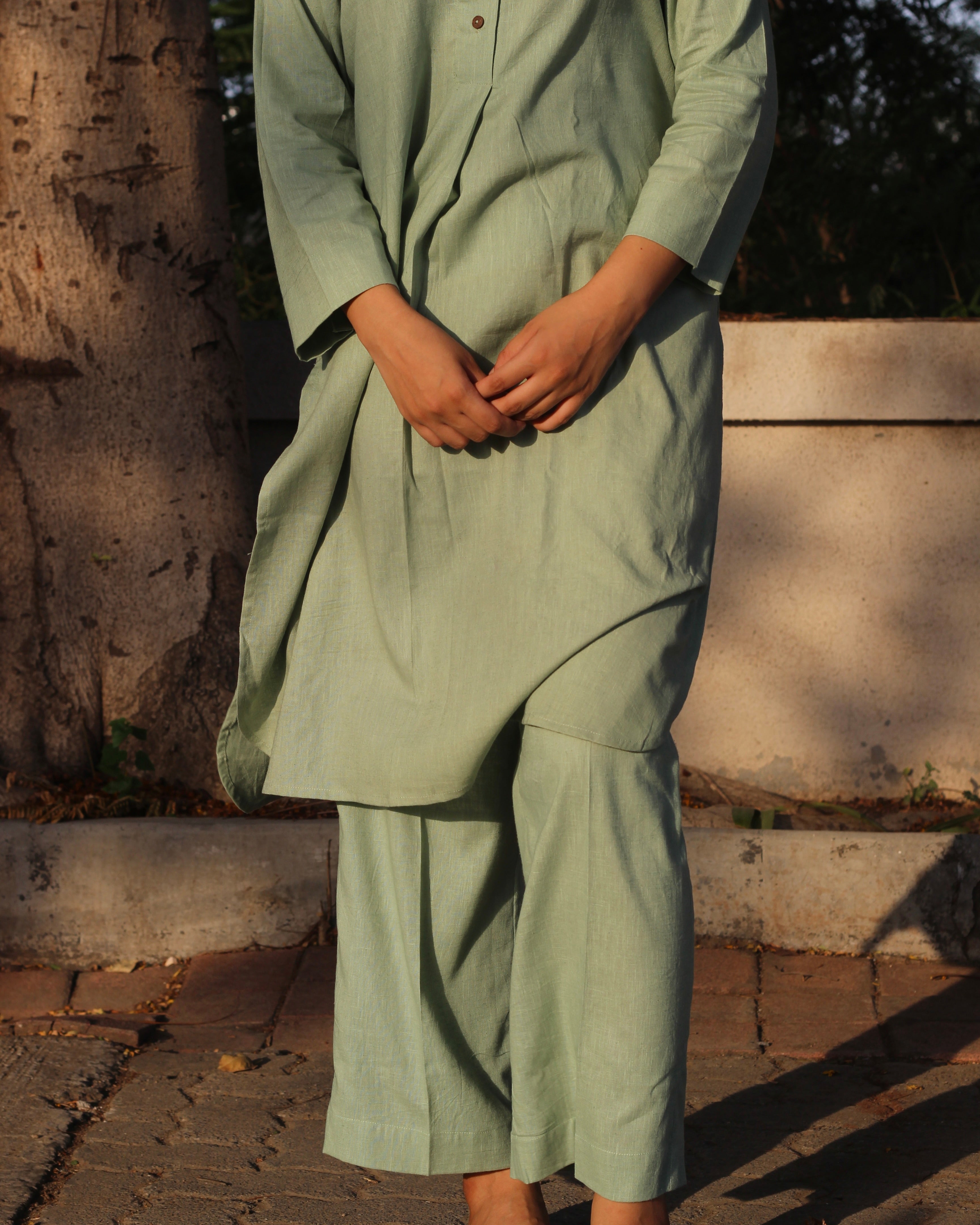 Light Pista Green Linen Co-ord Set - Round Neck Kurta with Brown Buttons, Side Cut, Box Style Back, and Comfortable Pants