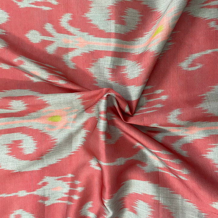 Ikkat print pattern on pink linen satin fabric per meter