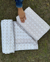 Set of 2 Reversible Dohars - Beige Ikkat Print on White Base and White Ikkat Print on Beige Base, each measuring 1.5 x 2.3 meters