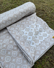 Set of 2 Reversible Dohars - Beige Ikkat Print on White Base and White Ikkat Print on Beige Base, each measuring 1.5 x 2.3 meters