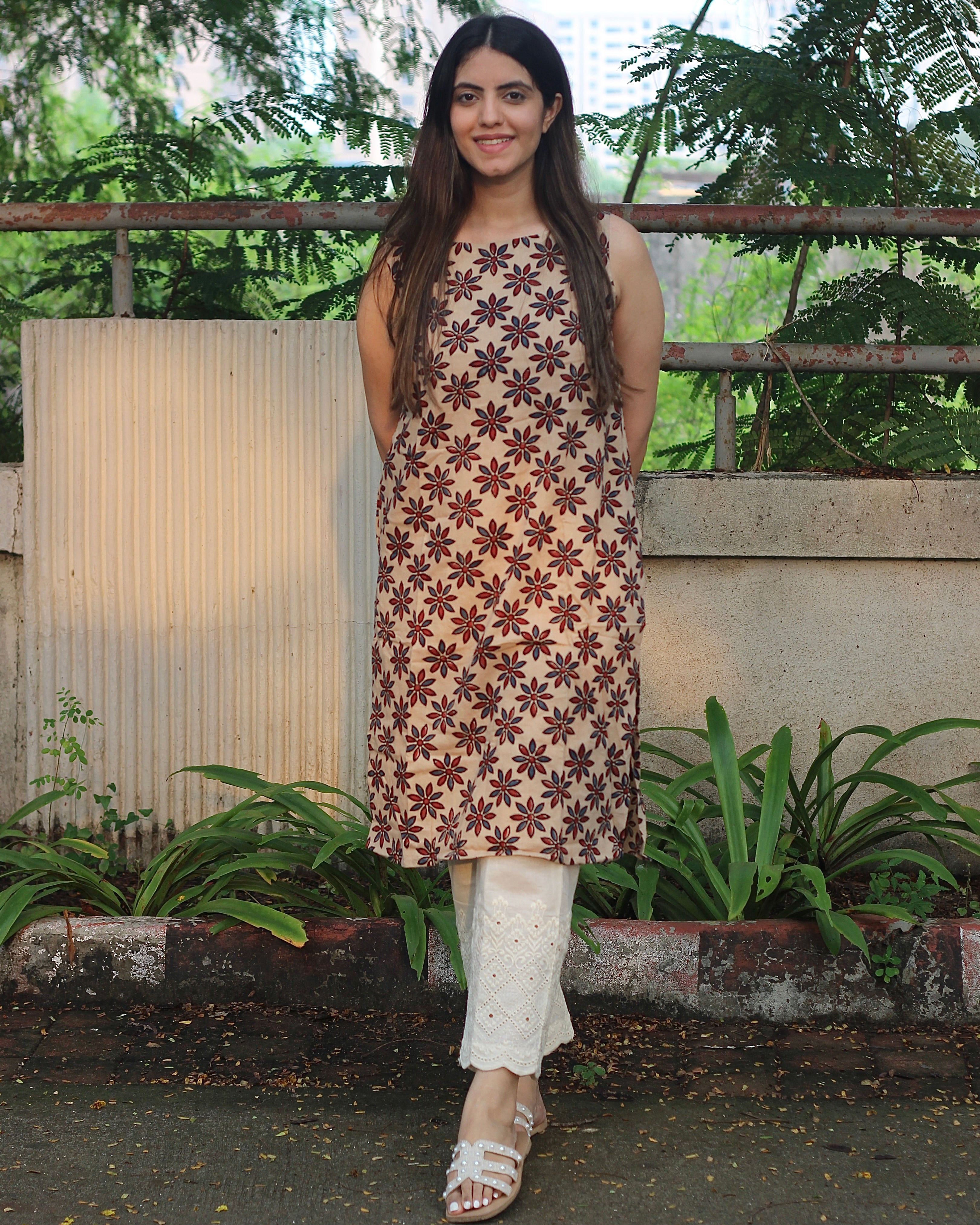 Sleeveless Ivory Kurta with Blue and Red Symmetrical Flower Print, Boat Neck, and Side Cut