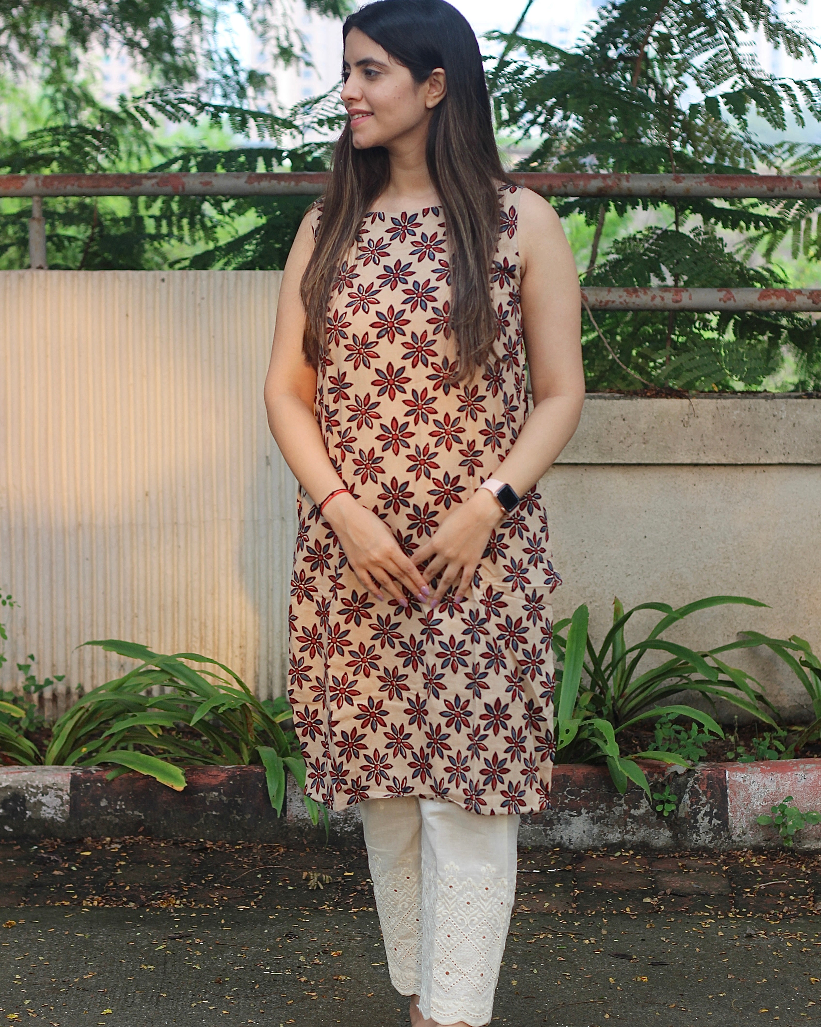 Sleeveless Ivory Kurta with Blue and Red Symmetrical Flower Print, Boat Neck, and Side Cut