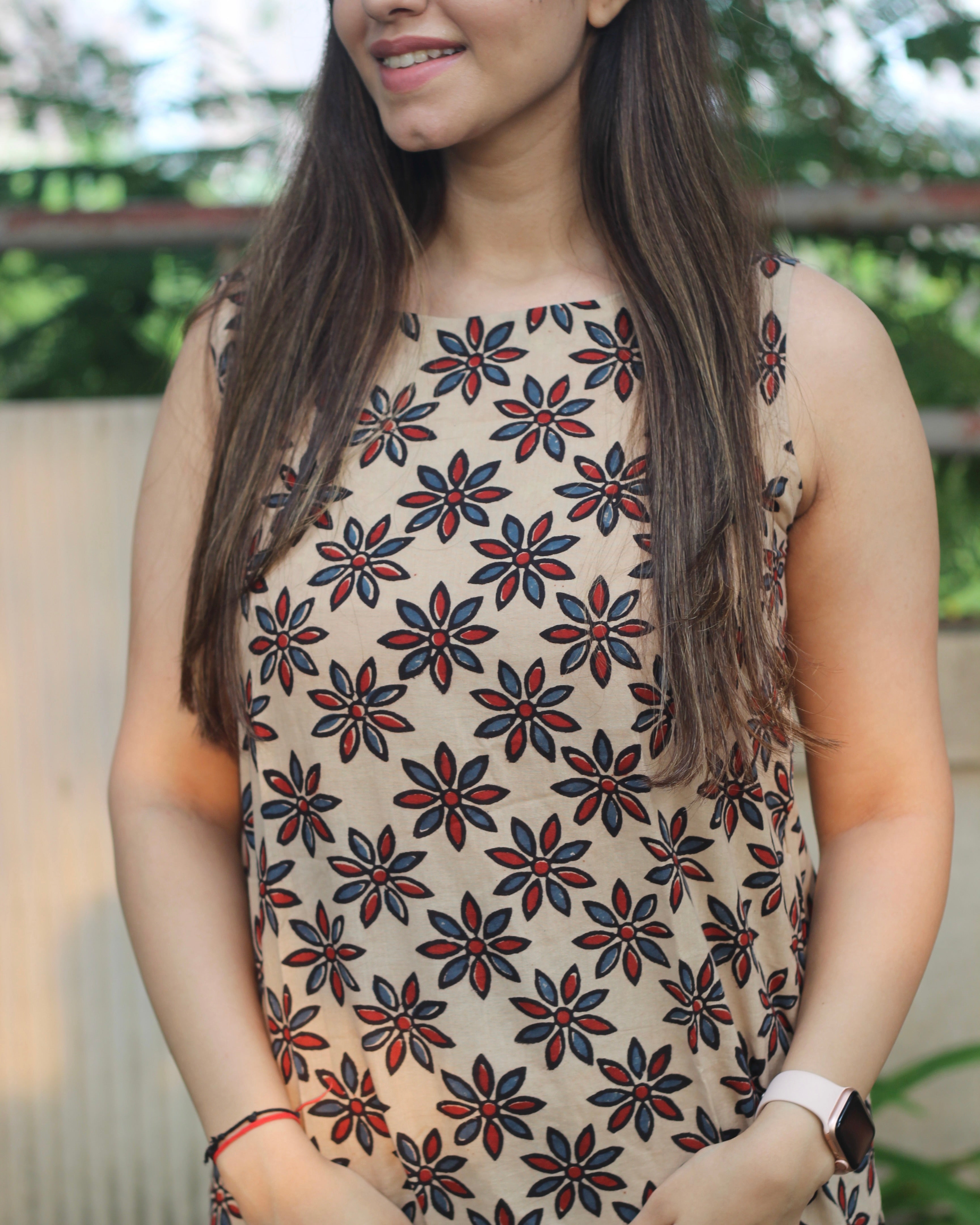 Sleeveless Ivory Kurta with Blue and Red Symmetrical Flower Print, Boat Neck, and Side Cut