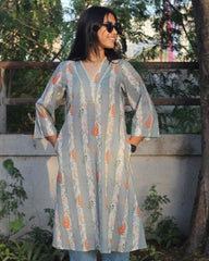 A-line long kurta in premium cotton with green stripe print, orange leaf elements, V-neck lace details, and dual pockets