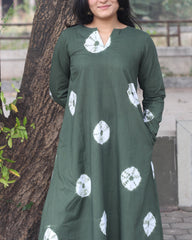 Dark green tye-dye bandhani pure cotton kurta with white bandhani print, long sleeves, V-neck, and pockets.