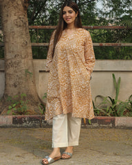 Mustard Harmony Long Kurta in premium cotton with mustard yellow and white floral-geometric print, styled with white pants