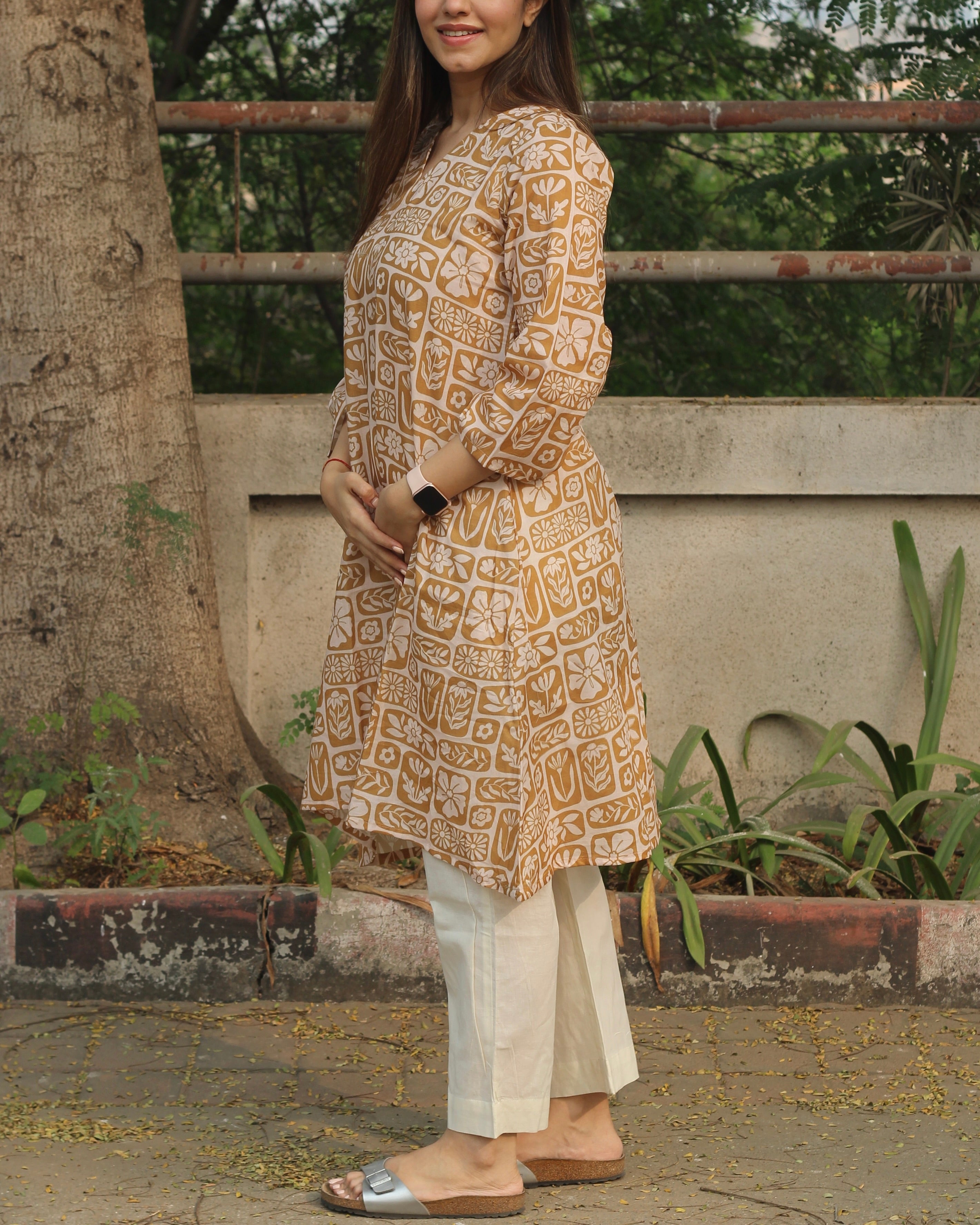 Mustard Harmony Long Kurta in premium cotton with mustard yellow and white floral-geometric print, styled with white pants