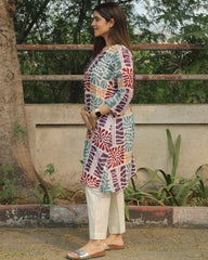 Prism Abstract Print Long Kurta in Multicolor with V-neck and side pockets, crafted from premium cotton, paired with white pants.