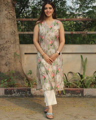 Floral Bliss Sleeveless V-neck Long Kurta in premium cotton, featuring floral print on light mauve base and side cuts, paired with white pants