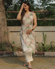 Floral Bliss Sleeveless V-neck Long Kurta in premium cotton, featuring floral print on light mauve base and side cuts, paired with white pants