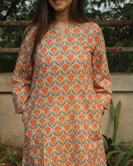 Ikkat Harmony Long Kurta in premium cotton with yellow and pink ikkat print, round neck with V-cut, and side pockets.