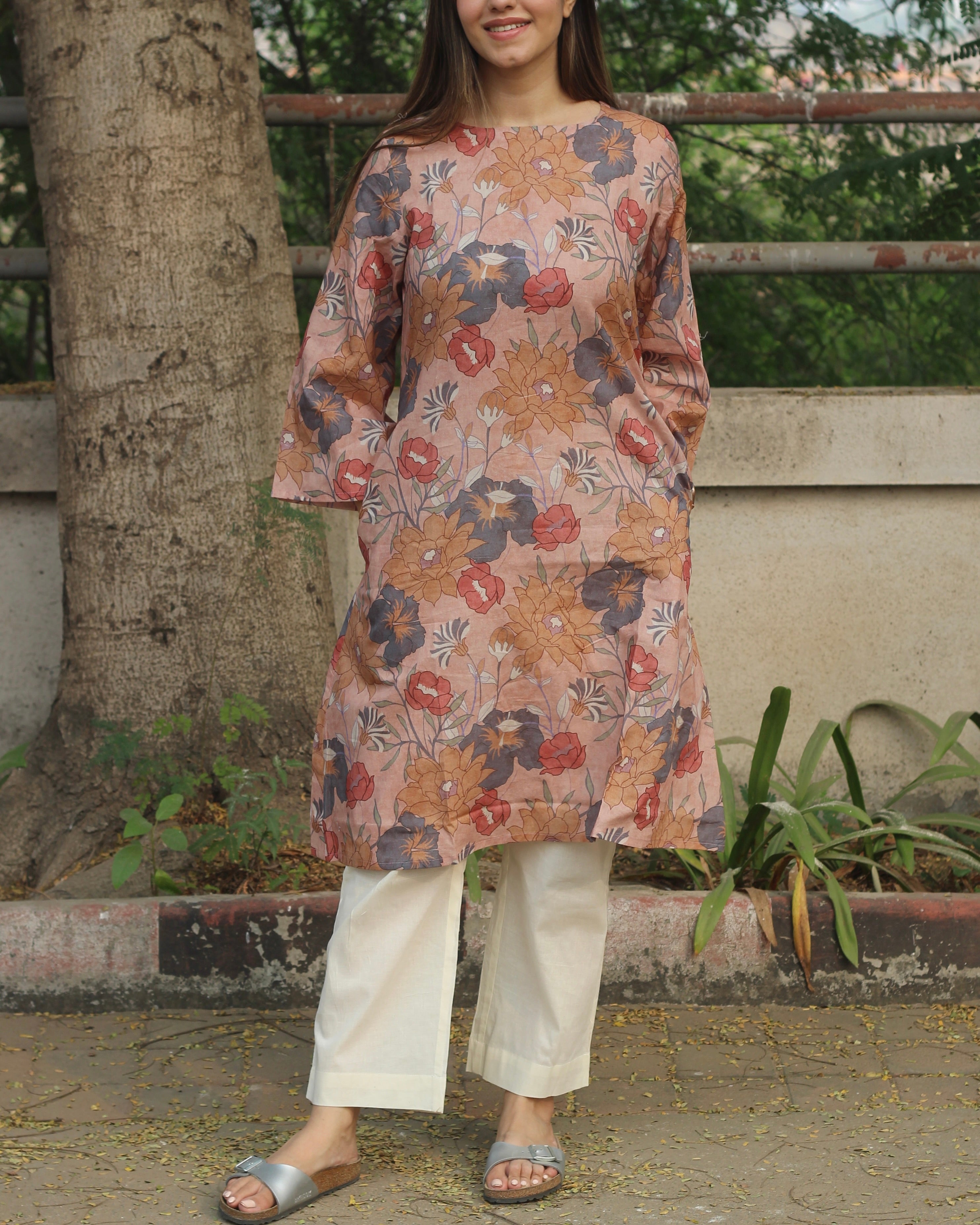 Dusty Bloom A-Line Long Kurta in premium cotton with dusty floral print, round neck, 3/4 sleeves, and side pockets