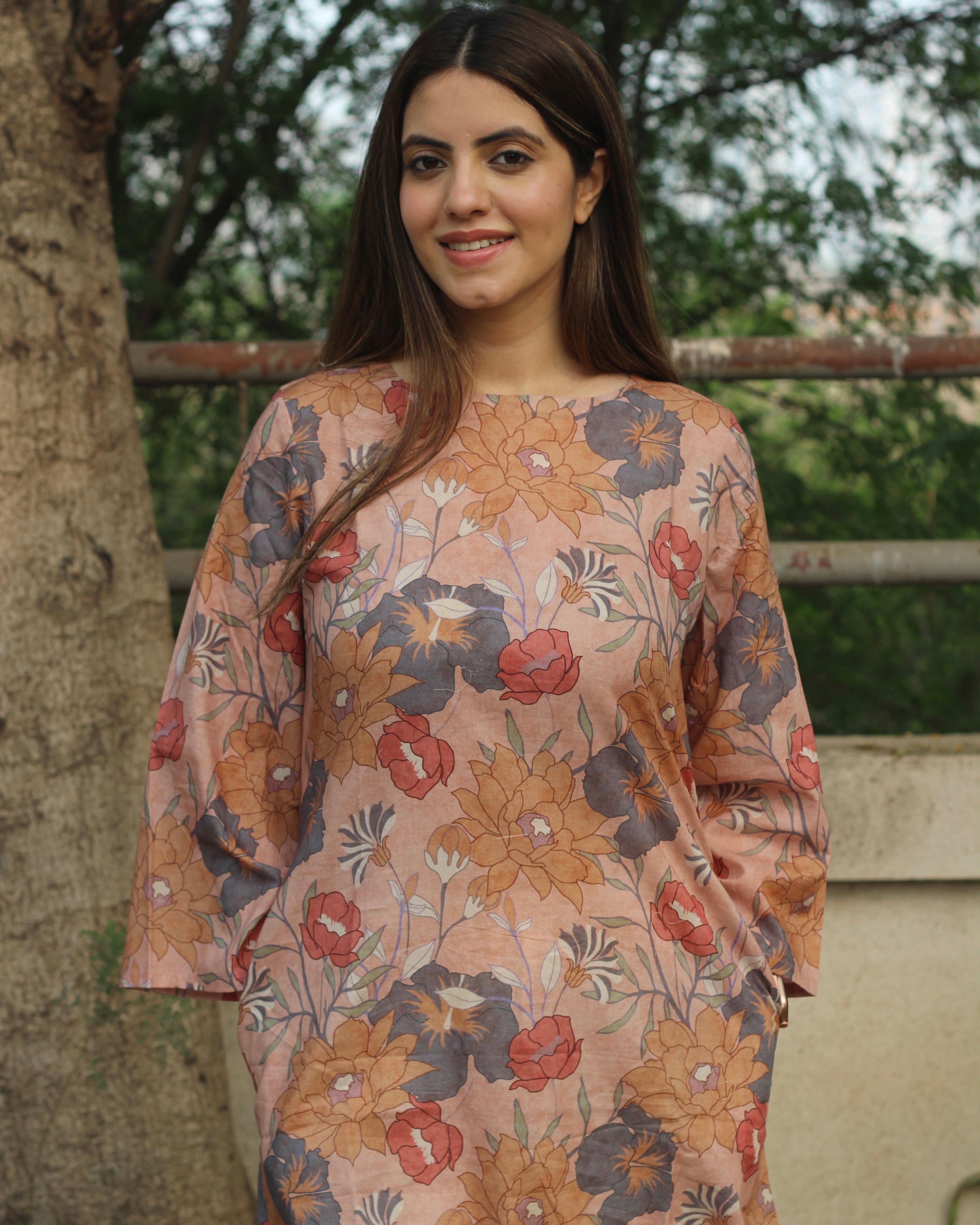 Dusty Bloom A-Line Long Kurta in premium cotton with dusty floral print, round neck, 3/4 sleeves, and side pockets