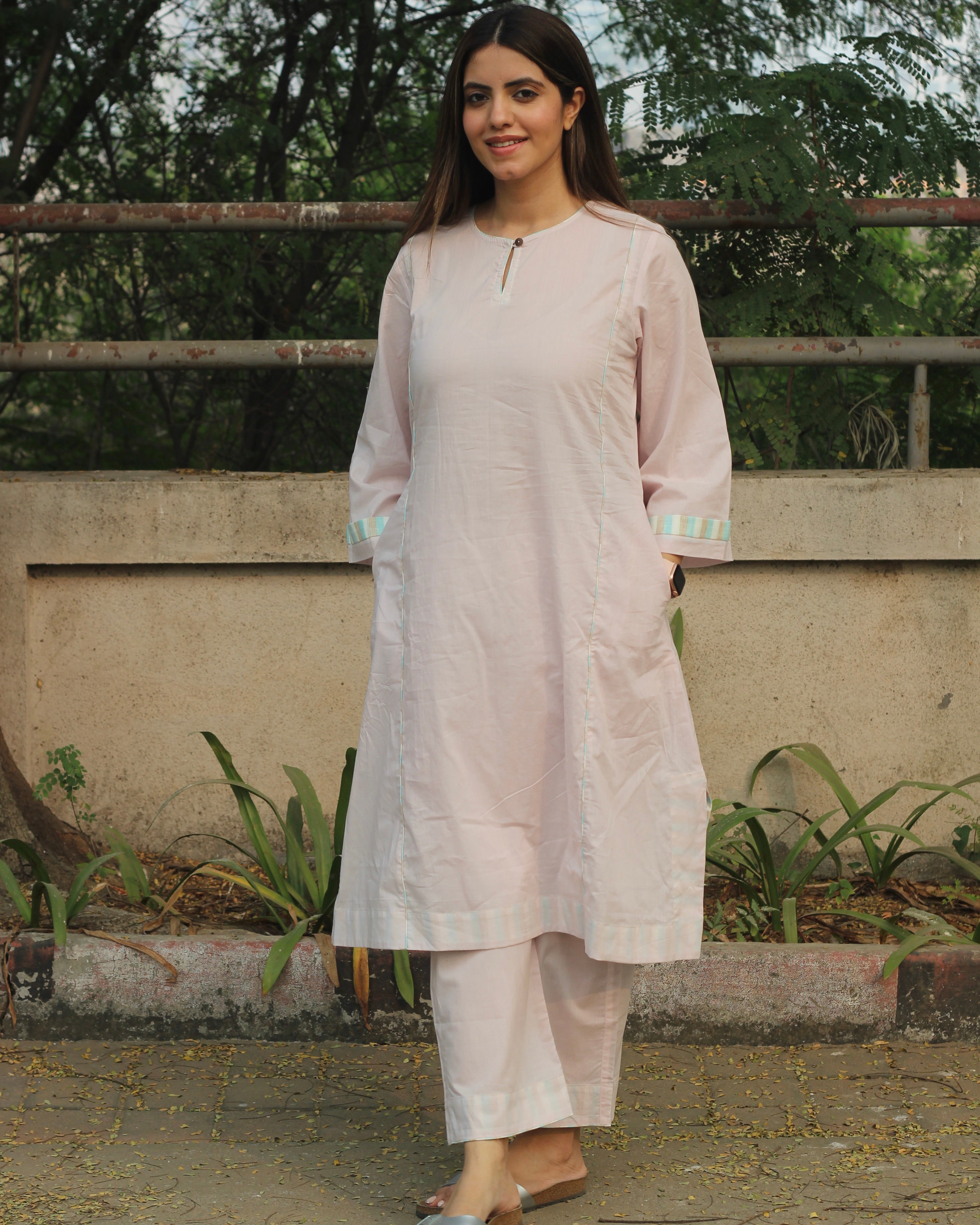 Subtle Charm Premium Cotton Kurta & Pant Set in baby pink with delicate stripes, round neck with loop, side cuts, and pockets