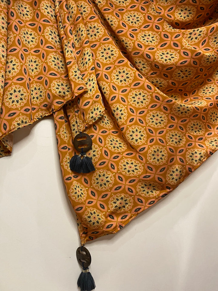 Symmetrical ethnic design on two tone dupatta with tassels