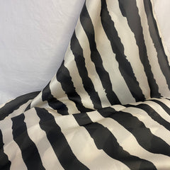 Black and off white water effect stripes print on georgette satin per meter